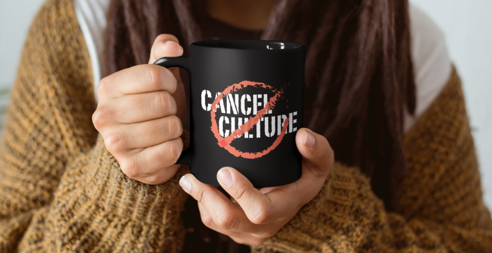 Cancel Cancel Culture Coffee Mug - 11oz/Black woman holding coffee mug wearing a sweater